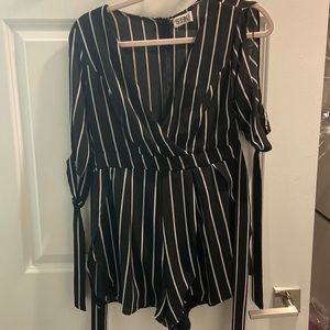 Black with white vertical stripes romper